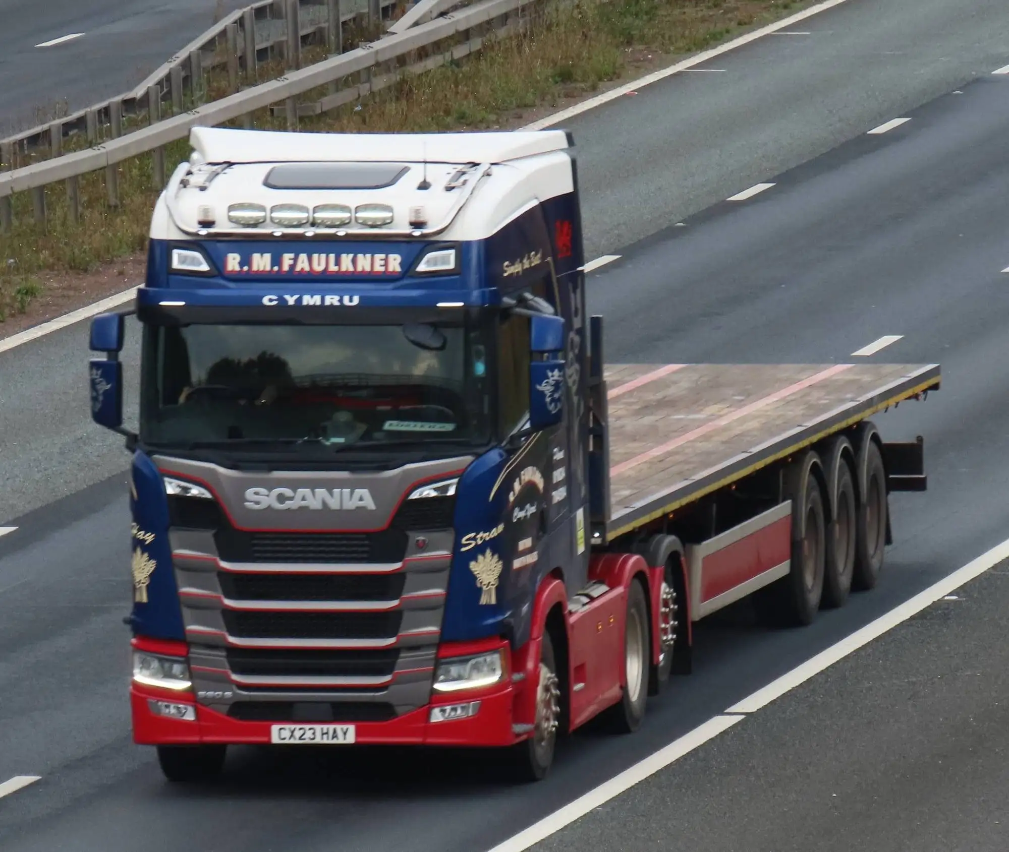 Scania CX23 HAY in R M Faulkner livery on the motorway